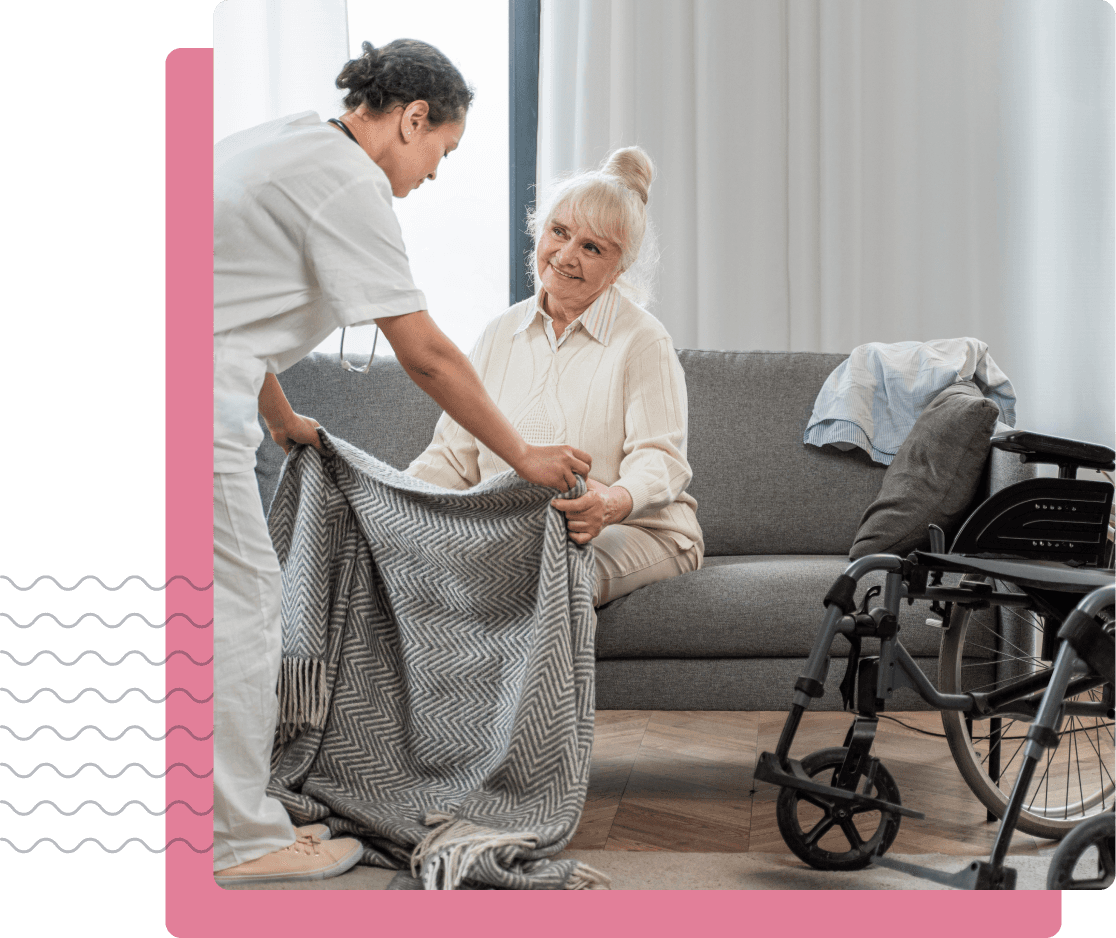 Caregiver helping elderly person
